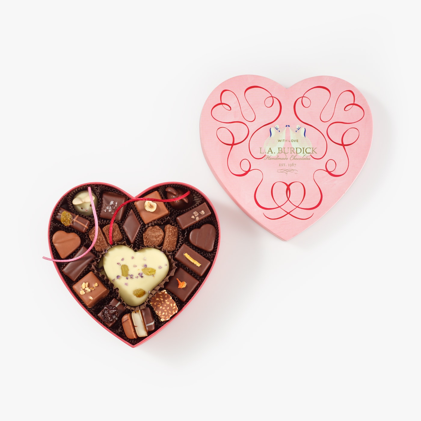 Signature Chocolate Mouse and other handcrafted chocolates nestled inside our pink Heart Box for Valentine's Day.